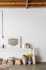 Selections from Breer's collection of books, vases, and sculpture.