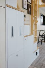 Stevens installed as many storage cabinets and drawers as possible beneath the staircase.