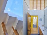 Left: The skylight in the bathroom where there's a tub and shower exposes a rectangular swath of bright blue sky. Right: The designers separated the functions of a bath, housing a toilet in one and a bathing area in the other. 