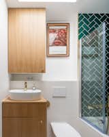 Saules by Hoch Studio bathroom with wood vanity