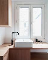 Saules by Hoch Studio kitchen sink with black faucet
