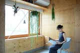 When architect Tomoko Sasaki, of Tenhachi Architect &amp; Interior Design, was commissioned to design a tiny house in Tokyo for a newly married couple who are both designers, she sought to&nbsp;"blur the line between furniture and architecture. The house is like a single, useful piece of furniture," Sasaki says.&nbsp;The front door of the home opens to an office, where a built in desk folds down to save space when not in use.