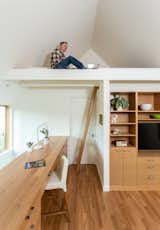 A sleeping loft above the second-level office accommodates sleepovers with visiting grandchildren.