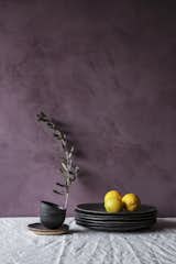 The purple shade on the existing home’s interior walls is another color found on the leaves of the olive trees that grow on the site.