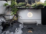 A Volcanic-Rock Courtyard Energizes a Dramatic Home in Shanghai - Photo 6 of 16 - 