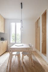 The kitchen-and-dining area is bathed in sunlight thanks to a tall window, and the apartment’s orientation.