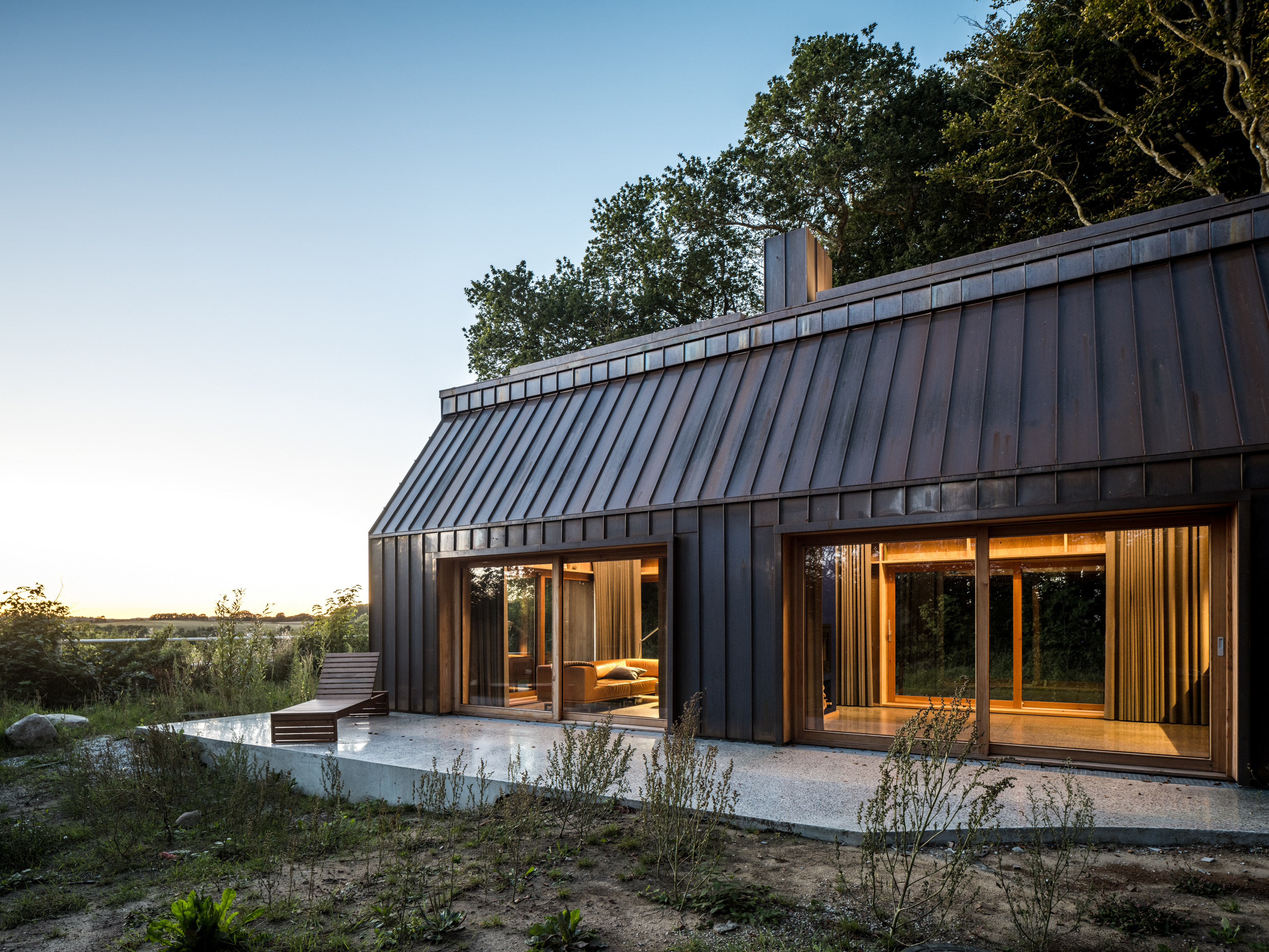 sigurd larsen and haas construct three elevated timber houses
