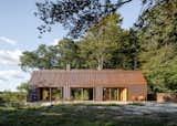 A Writer’s Copper-Clad Live/Work Space Blends Into the Forest in Denmark - Photo 2 of 14 - 