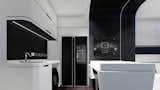 The futuristic tiny home measures 376 square feet and features an open-plan kitchen and dining area.