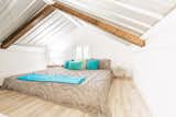A loft area at one end of the cottage can be arranged as a bedroom or used for extra storage.