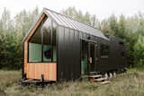 The tiny home in Canada that Heather and Kevin Fritz of Fritz Tiny Homes designed for their client Ashleigh Trahan and her partner Elyse is clad with metal and Douglas fir.