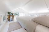 Elizabeth and Matt placed a loft-style sleeping area above the kitchen so that the tiny home can accommodate as many as four guests.