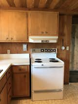 Before: Kitchen of Minne Stuga by Taiga Design + Build