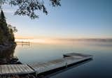 The home features its own dock and private access to the lake.