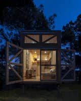 Exterior, Flat RoofLine, Tiny Home Building Type, and Wood Siding Material  Photo 18 of 18 in This Off-Grid Tiny Home Is One Retiree Couple’s Permanent Vacation