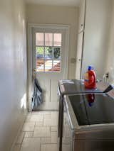 Before: Laundry room of Burbank Remodel by Hub of the House Studio