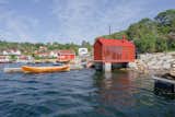 The boathouse is set on stacked granite slabs that rise out of the water. "To be sure the stones stay in place, we drilled a steel rod through the columns and down into the bedrock,