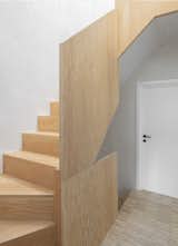 A Douglas fir staircase references the work of Alvar Aalto and makes a sculptural statement.