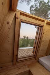 Loft Bedroom of Columba Tree House by Madeiguincho