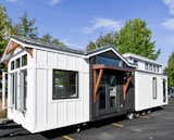 The tiny house's gable roof was crafted with standing seam metal.  Photo 2 of 13 in Budget Breakdown: A $237K Tiny Home on Wheels Brings Kids, Parents, and Their Parents Together
