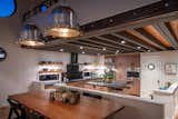 The kitchen and kitchen lighting were planned and organized by Jane Ariyoshi of Kozo Designs, Tiburon. The cabinetry was crafted by Herb Zacks Woodwork, Petaluma. The live-edge shelves are by Karl Stark of Peroba Reclaimed Wood, Richmond.