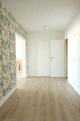 Patterned wallpaper marked the original entry hall.