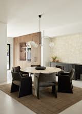 Now, a larger opening between the dining room and the kitchen allows for spaciousness and added sunlight.