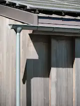 The cabin collects rainwater that can be used for watering, fire suppression, and backup water supply.