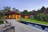 The 25 meter lap pool stores water for fire protection, and is an integral part of the home's heating system.  During winter the solar hot water heaters on the pool house roof heat radiant floors.  