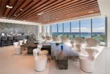 Living Room, Stools, Table, Ceiling Lighting, Bar, and Chair  Photo 3 of 6 in Hawaiian Oceanside Penthouse Asks $35M by Sotheby’s International Realty