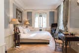 Bedroom, Night Stands, Bed, Lamps, Chair, Table Lighting, and Recessed Lighting  Photo 6 of 7 in Charming Brussels Escape For Sale by Sotheby’s International Realty