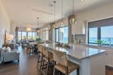 Kitchen, Medium Hardwood Floor, Pendant Lighting, Undermount Sink, and White Cabinet  Photo 2 of 6 in Contemporary Villas Overlooking Bermuda's South Shore Now For Sale by Sotheby’s International Realty