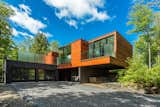 Exterior, House Building Type, Flat RoofLine, and Wood Siding Material  Photo 4 of 6 in An Exceptional Residence in Canada Asks $2.12M by Sotheby’s International Realty