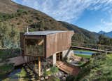 Exterior, House Building Type, and Wood Siding Material  Photo 1 of 9 in A Mountain Getaway in Chile With Over 700 Avocado Trees Asks $1.1M from A Sustainable Mountain Home in Chile Asks $1.36M