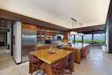 Kitchen, Range, Recessed Lighting, Refrigerator, Wood Cabinet, Pendant Lighting, Undermount Sink, and Wall Oven  Photo 3 of 5 in An Incredible Beachfront Estate in Hawaii Asks $19.8M by Sotheby’s International Realty