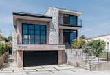 Exterior, Brick Siding Material, Concrete Siding Material, Glass Siding Material, Flat RoofLine, Metal Roof Material, and House Building Type  Photo 2 of 5 in A Stylish Townhome in Los Angeles Asks $1.5M by Sotheby’s International Realty