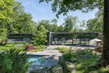 Outdoor, Walkways, Shrubs, Back Yard, Swimming Pools, Tubs, Shower, Boulders, Trees, Large Patio, Porch, Deck, and Grass  Photo 5 of 5 in An Exceptional LEED-Certified Estate in Connecticut Asks $4.75M by Sotheby’s International Realty