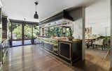 Kitchen, Medium Hardwood Floor, Accent Lighting, Undermount Sink, and Pendant Lighting  Photo 3 of 5 in An Inspiring Residence in Mexico City Asks $6.3M by Sotheby’s International Realty