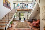 Staircase, Stone Tread, and Metal Railing  Photo 2 of 5 in A Marvelous Home in South Carolina Asks $3.49M by Sotheby’s International Realty