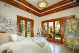 Bedroom, Bed, Dresser, Accent Lighting, Chair, Lamps, Night Stands, Ceiling Lighting, and Porcelain Tile Floor  Photo 7 of 11 in This Luxurious Mediterranean-Style Estate in California Asks $5M by Sotheby’s International Realty