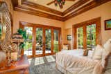 Bedroom, Ceiling Lighting, Carpet Floor, Bed, Chair, and Storage  Photo 9 of 11 in This Luxurious Mediterranean-Style Estate in California Asks $5M by Sotheby’s International Realty