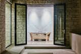 Bath Room, Concrete Floor, and Freestanding Tub  Photo 4 of 6 in This Stunning Home in California Lists for 4M by Sotheby’s International Realty