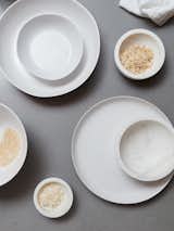 The Simple Dinnerware Collection by Hawkins New York is both organic and modern. The shapes were originally all hand formed and then cast to create a handmade feel. Intended for everyday use, the collection is made of durable stoneware having a simple, matte, white glaze.  All pieces are dishwasher, microwave, and oven safe.