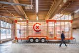 Modular and mobile—the (MWU) houses five work stations in 280 square feet and is parked inside an old ambulance garage in downtown Portland—ready to be hitched to a trailer and relocated should the need arise.