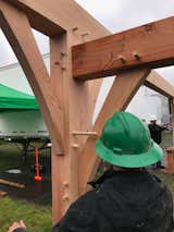 The New Energy Works Timberframers event raised a structure with solar panels at their big timber event, Thinking Outside the Frame: Traditional Craft Melds With Modern Technology.
