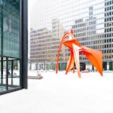 Flamingo large industrial metal sculpture by Alexander Calder in front of Ludwig Mies van der Rohe's Kluczynski business building