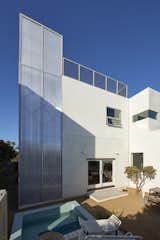 The Vertical Venice Prefab (V.V3) is a triple-stacked steel modular addition to Siegal’s existing 1920’s Venice bungalow home. Craned in over the existing home and installed in one day, the 560 sf modular addition uses a diagrid structural system wrapped in Polycarbonate panels to maximize light, energy and efficiency.