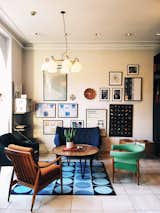 Living Room, Chair, Sofa, Coffee Tables, Shelves, Storage, and Pendant Lighting The retro-chic vibe of Copenhagen's Hotel Alexsandra  Photos from Get Your Fix of Midcentury Scandinavian Design at This Copenhagen Hotel