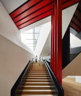 An ascending staircase leading to the underground gallery space.  Photo 5 of 10 in Part of an Epic Expansion, London’s V&A Museum Paves its Courtyard With 11,000 Porcelain Tiles