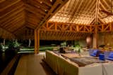 The living/dining area is in a palapa made of natural parota wood which is over 33 feet high.